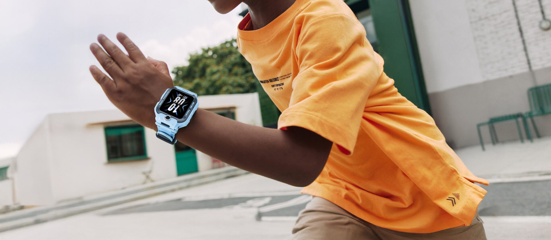 Child wearing imoo Watch Phone Z7 in White-Gold on wrist, showing 80 BPM and 10:08 time outdoors.